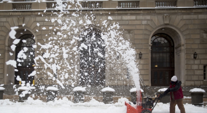 Cold weather slows economic growth