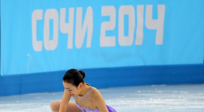 Japan's Asada has sudden, deep fall on Olympic ice