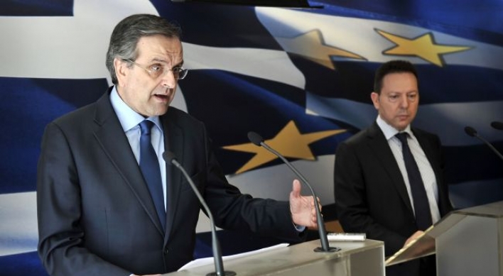 Greece reaches troika deal