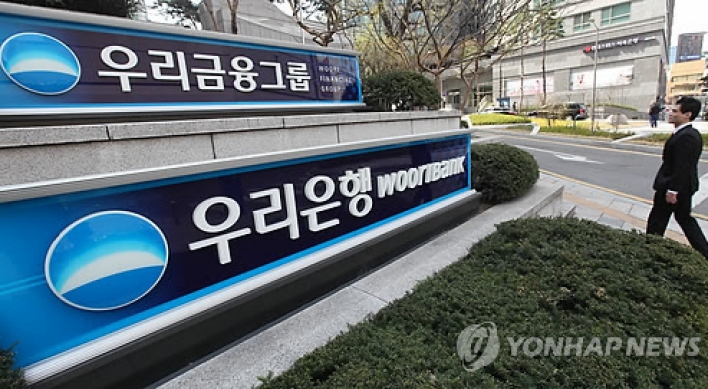 Regulator resumes probe into Woori Bank