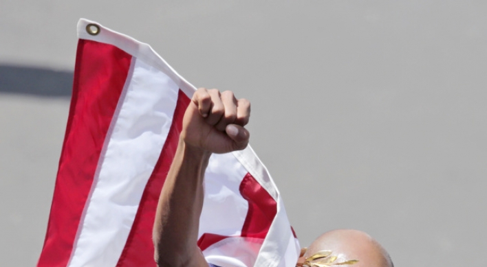 Runners reclaim Boston Marathon