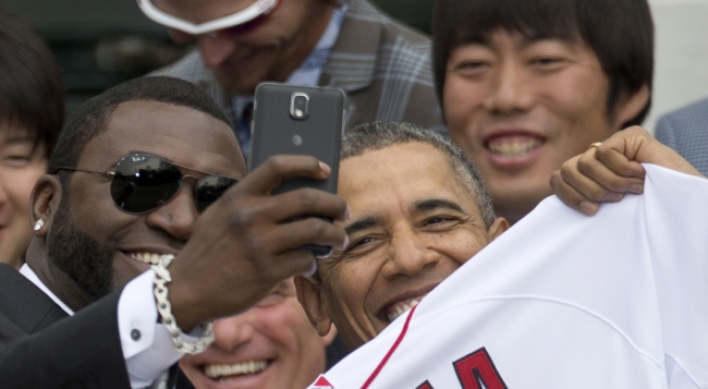 U.S. president shrugs off selfie-sharing controversy