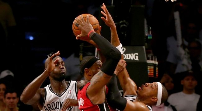 LeBron scores 49 as Heat beat Nets