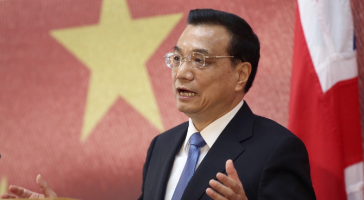 China will avoid hard landing while limiting stimulus, Li says