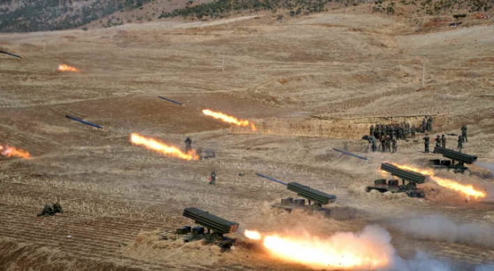 North Korea fires 100 artillery shells into East Sea