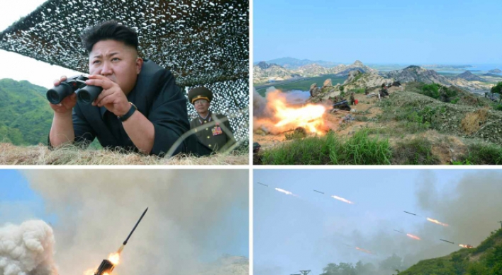 N.K. leader oversees live-shell firing exercise