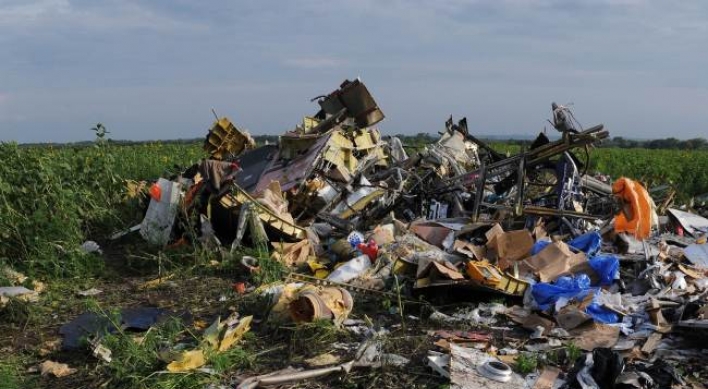 France, U.K. trade hypocrisy claims over MH17 sanctions, analysts say