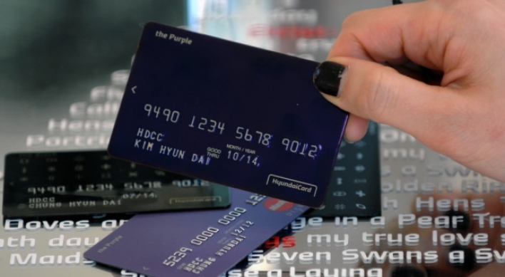 Credit card firms brace for debit card campaign