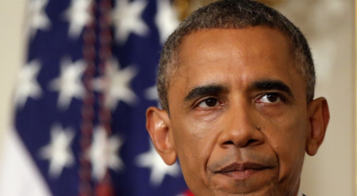 Obama authorizes air strikes to prevent Iraq 'genocide'