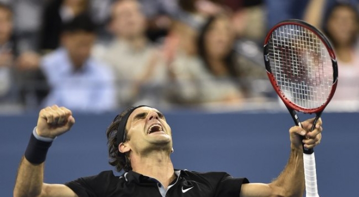 Federer saves 2 match points, reaches U.S. Open semis