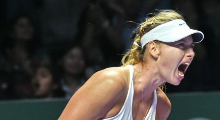 Wozniacki beats Sharapova at WTA Finals