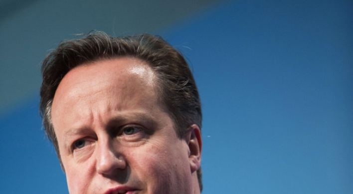 Cameron warns Britain’s recovery faces ‘real risk’