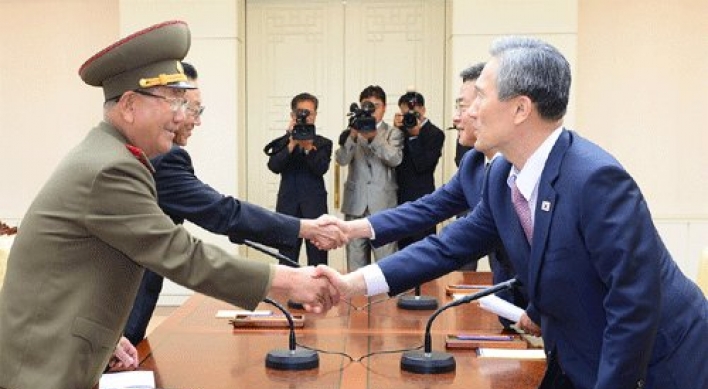 Two Koreas reach deal to ease military tensions