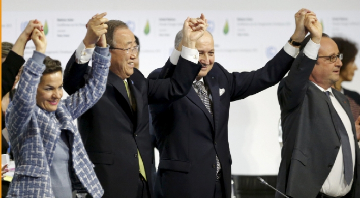 Euphoria as landmark Paris climate deal adopted