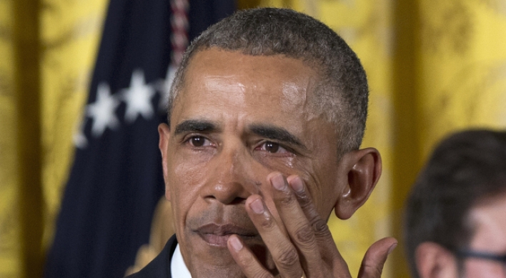 Tearful Obama pleads for 'urgency' on gun control