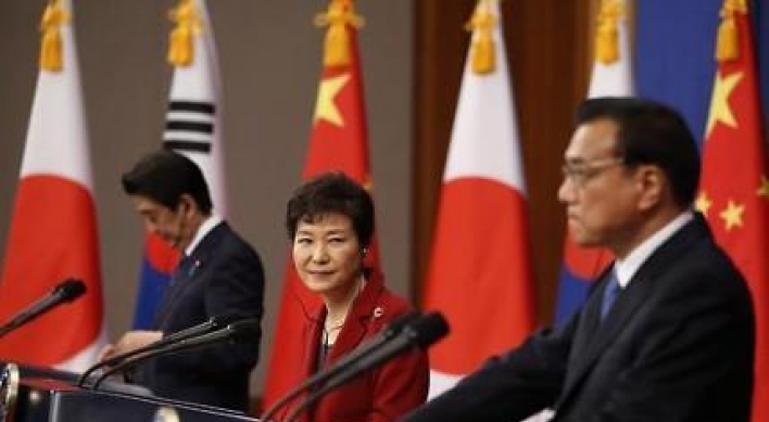 Seoul shows mixed response to closer economic ties between China, Japan