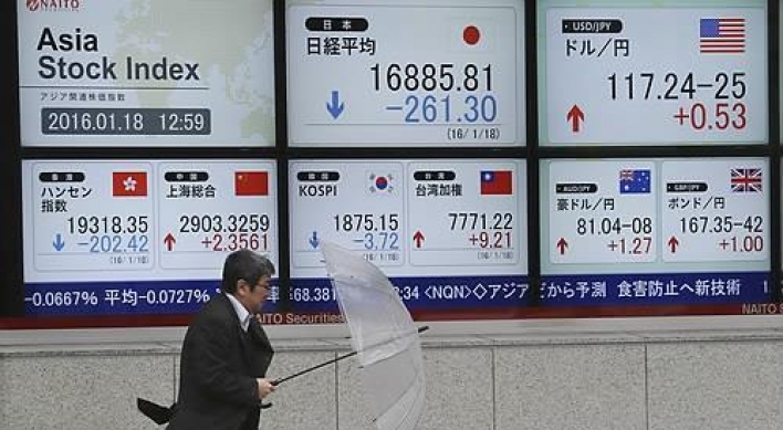 Tokyo stocks open sharply lower on stronger yen