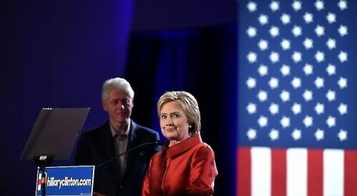 Clinton wins Nevada caucus, Republicans vote in South Carolina