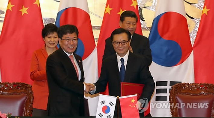 Seoul, Beijing start talks on removing non-tariff barriers