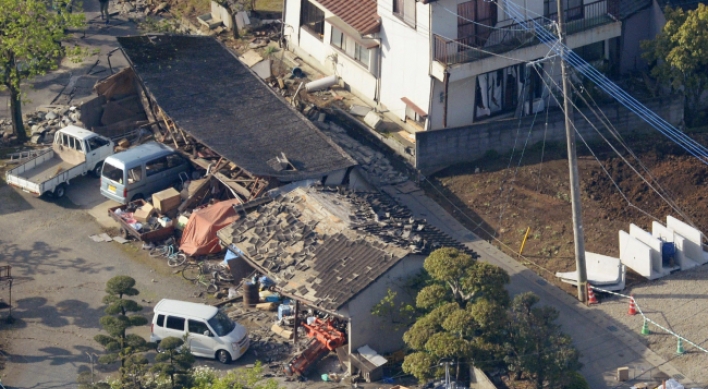 Strong quake in southwestern Japan kills nine, topples homes
