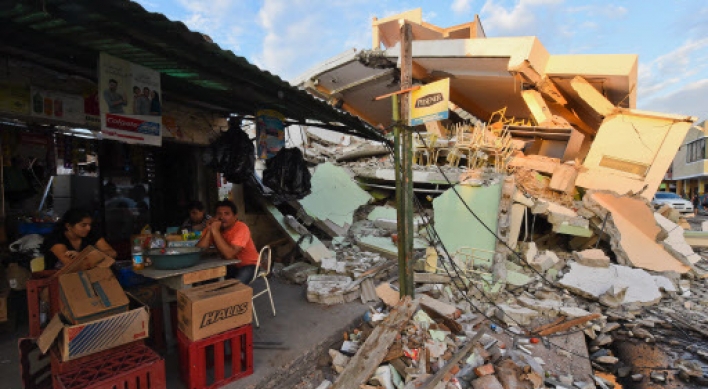 Ecuador digs for survivors after quake kills 246