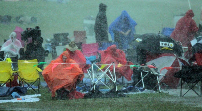 Jazz fest’s last day finishes soggy, but strong