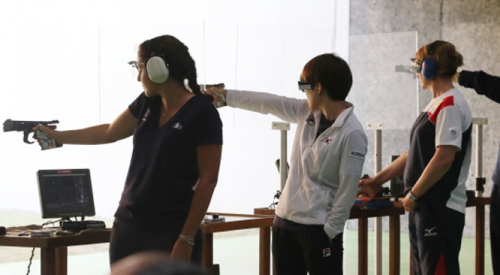 Reigning gold medalist fails to reach pistol shooting final