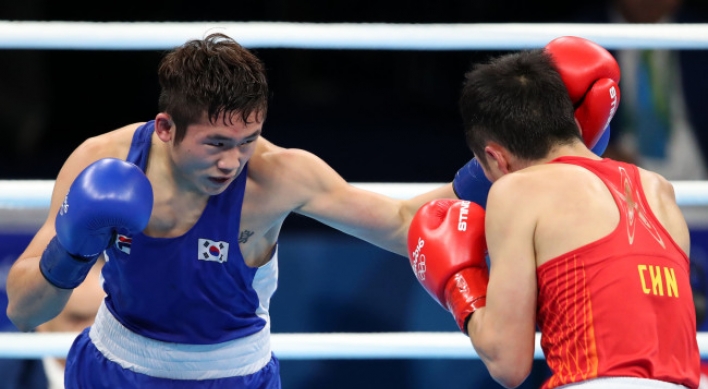 Lone Korean boxer loses in competition's 2nd round