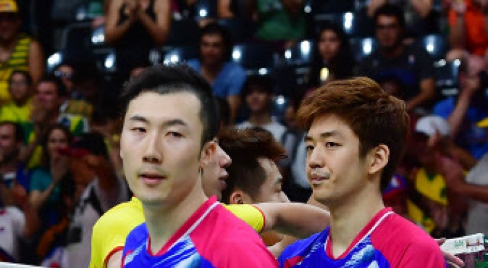 Top-ranked men's badminton duo shocked in quarters