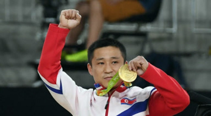 North Korean gymnast wins vault gold