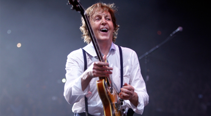 McCartney working on new album, signs with Capitol