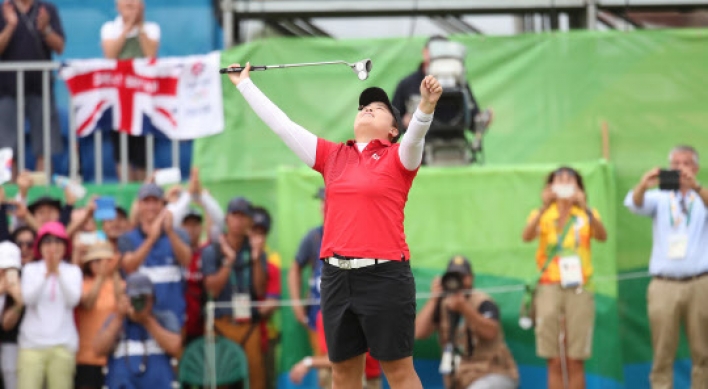 Golfer defies odds for gold