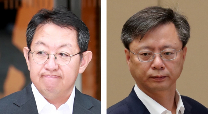 Cheong Wa Dae says aide Woo will stay in post