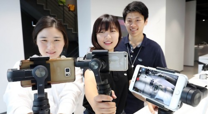 DJI unveils 3-axis handheld stabilizer for phone camera