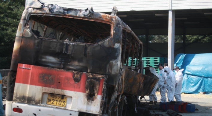 Careless driving blamed in bus fire that killed 10