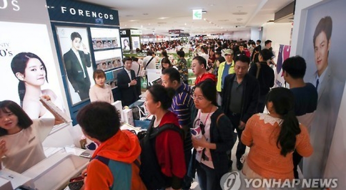 Duty-free stores embrace younger Chinese customers