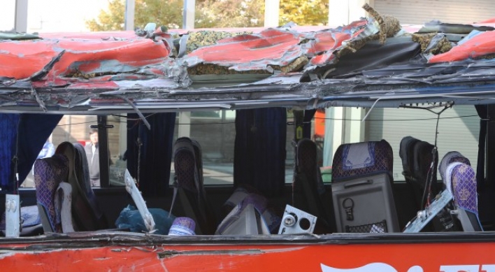 Tourist bus flips sideways, four passengers killed, some 40 injured