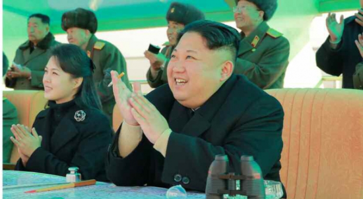 N. Korean leader, wife make appearance at air combat competition