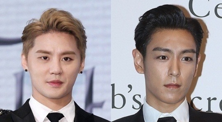 Big Bang's T.O.P, JYJ's Kim Jun-su enlist in military