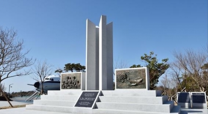 US airman honored by monument for rescuing war orphans