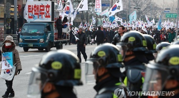 16 under police probe for violent rallies after Park's ouster