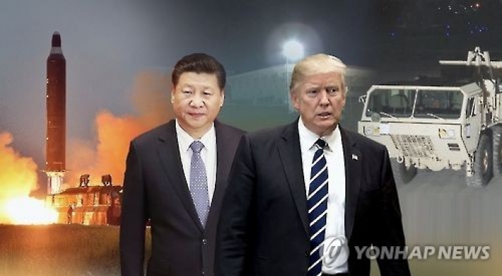 (Urgent) Xi urges peaceful resolution of NK threat in call with Trump