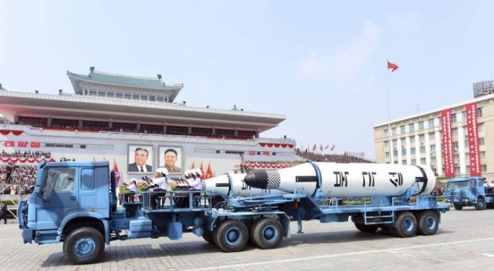China defends N. Korea trade after its trucks haul missiles