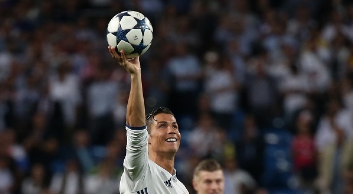 Ronaldo hat trick puts Madrid into Champions League semis