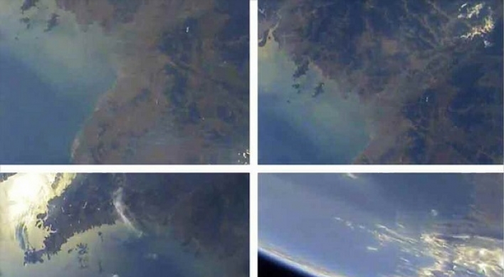 N. Korea unveils scores of earth photos taken from atmosphere