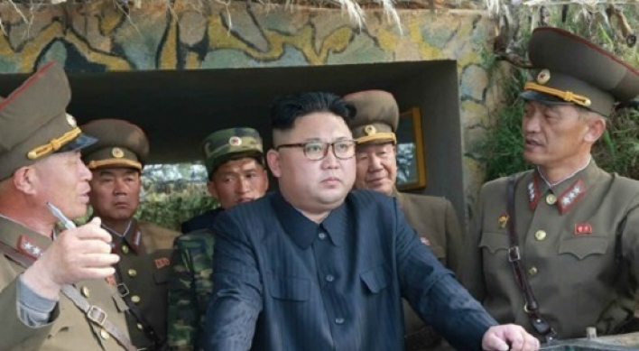 NK leader inspects test-fire of new anti-aircraft weapon
