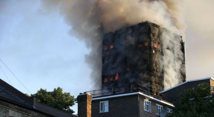 Death toll rises to 12 in London apartment building inferno