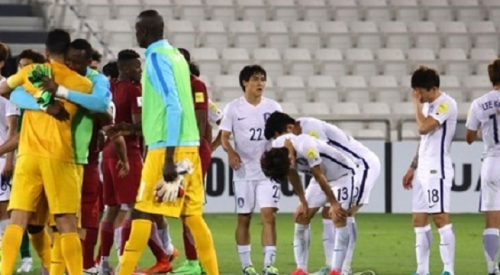 Men's nat'l football team makes solemn return from loss in Qatar