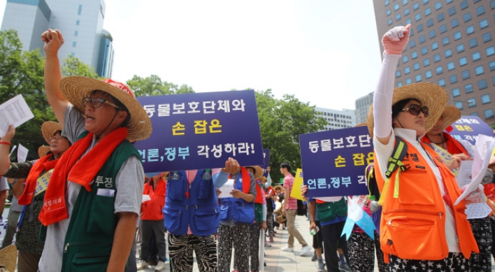 Protesters call for legalization of dog meat trade