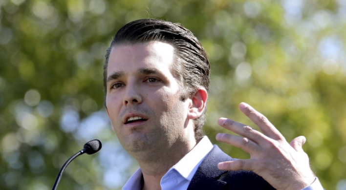 Trump’s son met Russian to get dirt on Clinton